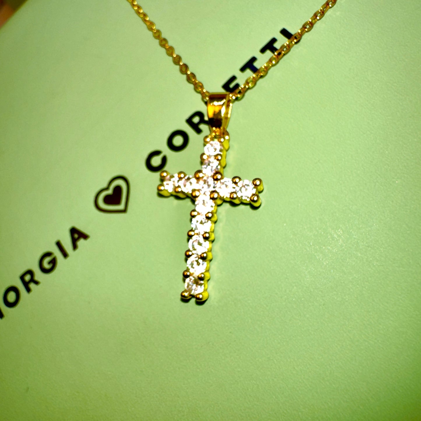 TRINITY CROSS NECKLACE
